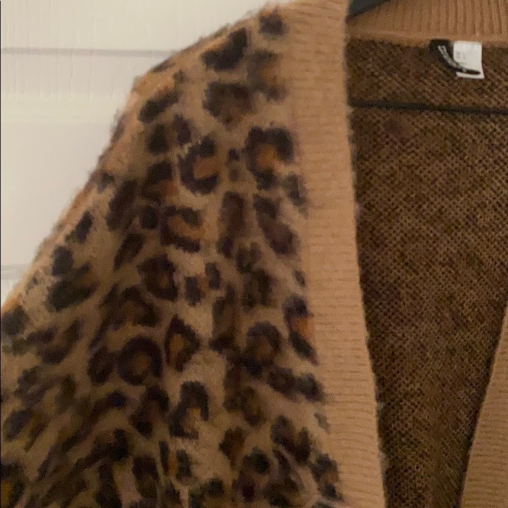 Leopard print acrylic sweater.